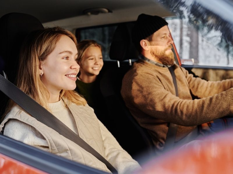 Family,Of,Three,Travelling,By,Car